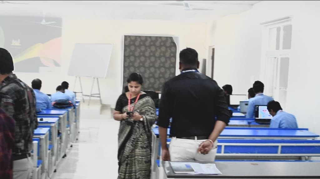The lab aisle, with learners working at their machines